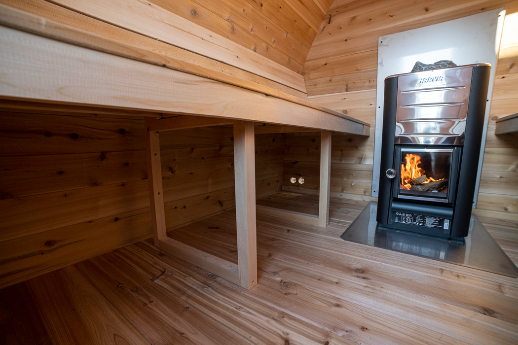 CT MiniPOD Sauna: 7x7, Handcrafted in Canada, 1.5" Eastern White Cedar, Seating for 4, Tempered Glass Door, Asphalt Shingles, Wood Burning or Electric Heater Options.