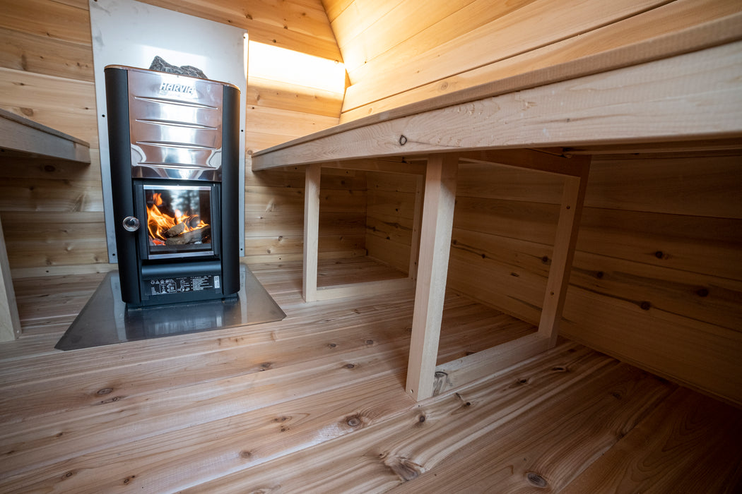 CT MiniPOD Sauna: 7x7, Handcrafted in Canada, 1.5" Eastern White Cedar, Seating for 4, Tempered Glass Door, Asphalt Shingles, Wood Burning or Electric Heater Options.