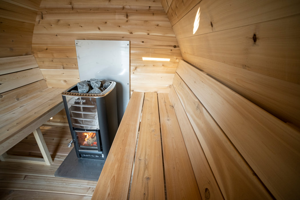 CT MiniPOD Sauna: 7x7, Handcrafted in Canada, 1.5" Eastern White Cedar, Seating for 4, Tempered Glass Door, Asphalt Shingles, Wood Burning or Electric Heater Options.