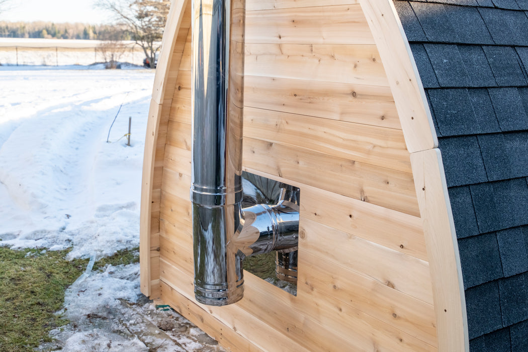 CT MiniPOD Sauna: 7x7, Handcrafted in Canada, 1.5" Eastern White Cedar, Seating for 4, Tempered Glass Door, Asphalt Shingles, Wood Burning or Electric Heater Options.