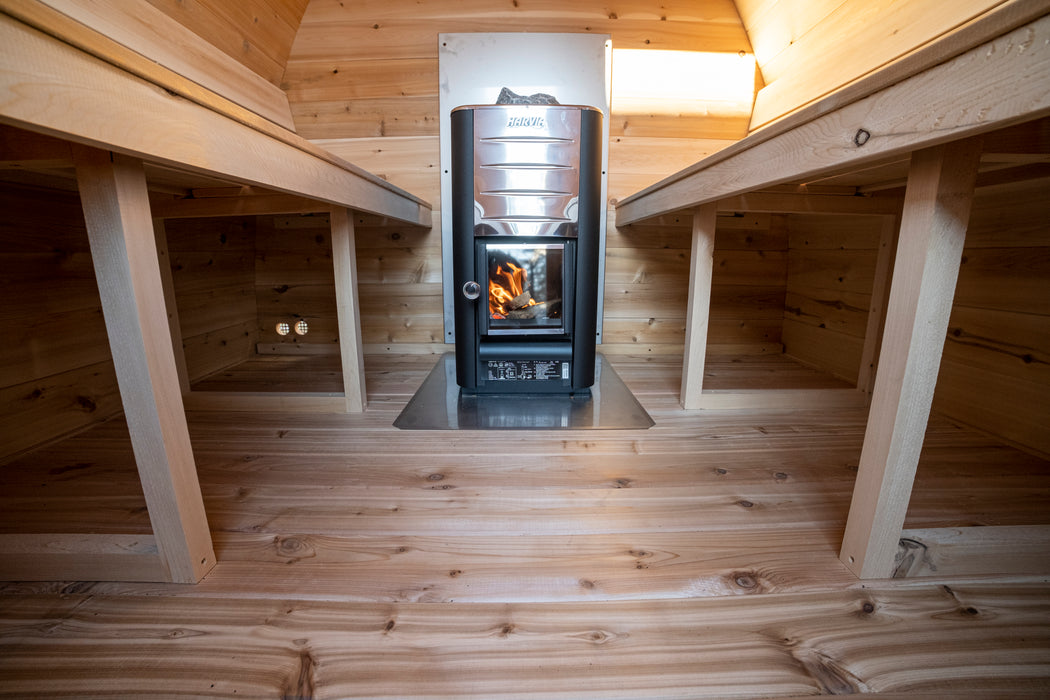 CT MiniPOD Sauna: 7x7, Handcrafted in Canada, 1.5" Eastern White Cedar, Seating for 4, Tempered Glass Door, Asphalt Shingles, Wood Burning or Electric Heater Options.